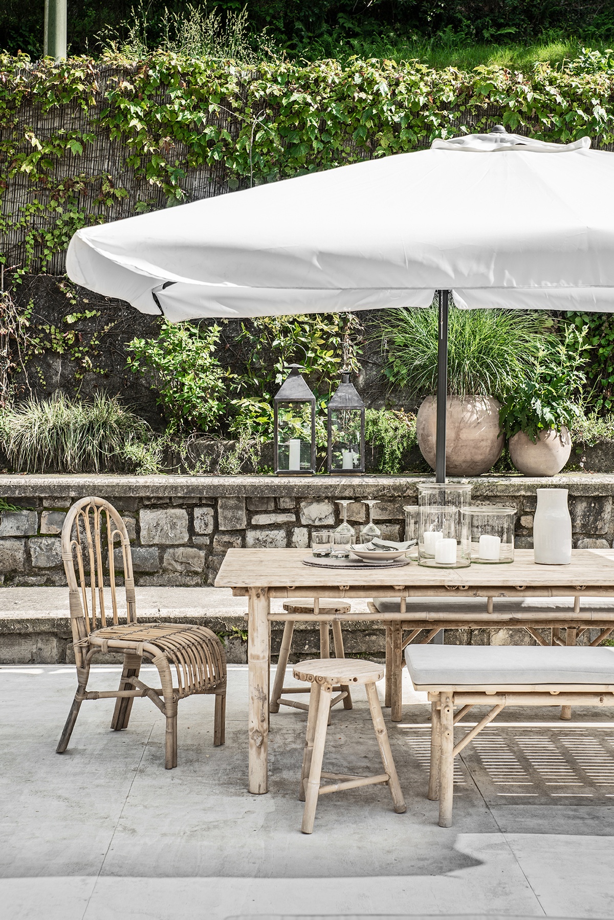 Lido Di Lenno beach bar at Lake Como, Italy decorated with tinekhome rattan furniture and bamboo furniture