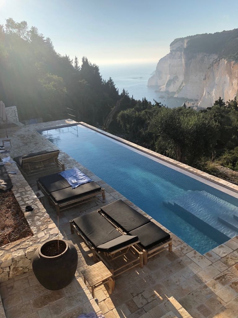 Patroclus rental home in Paxos, Greece. The home is decorated with bamboo chairs and tables.