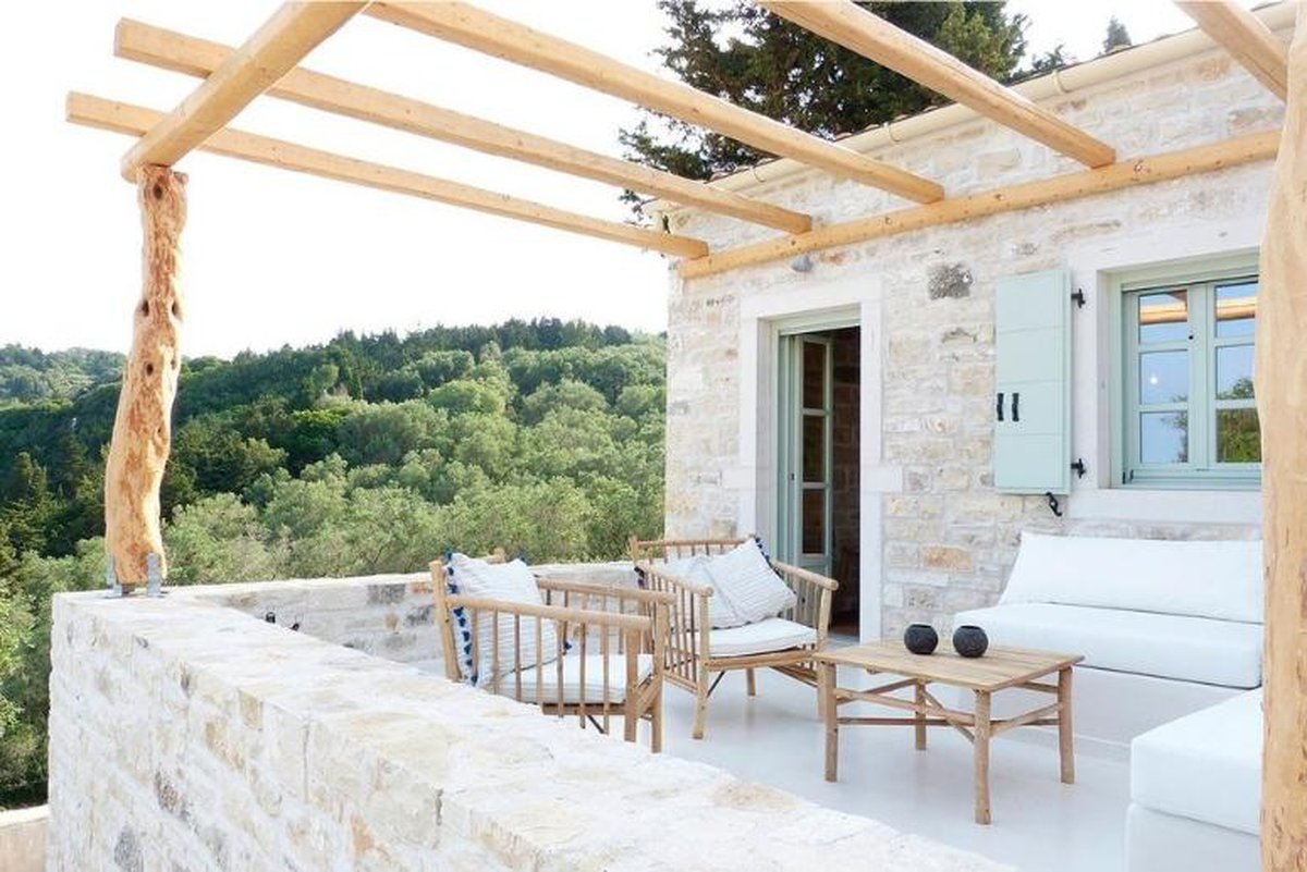 Patroclus rental home in Paxos, Greece. The home is decorated with bamboo furniture and lanterns from Tinekhome