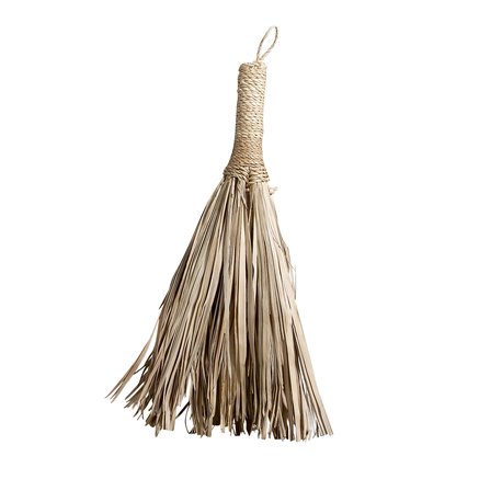 Small broom of palm leaves
