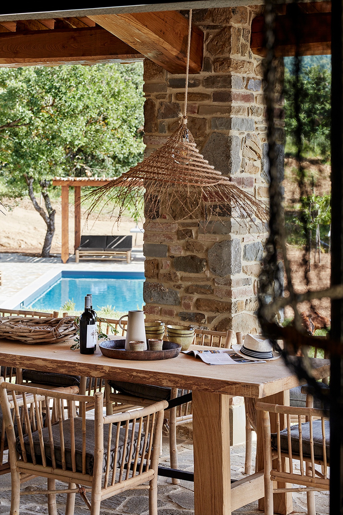 Il Nido rental home with bamboo dining table and matching dining chairs.